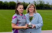 18 May 2019; AIB captain Deborah Brennan is presented with the cup by Marie Hickey, President, LGFA, after beating PWC in the Cup final at the LGFA Interfirms Blitz 2019 at Naomh Mearnóg GAA Club, Portmarnock, Dublin. This year 12 teams competed for the top prize, while 11 teams signed up to take part in a recreational blitz. Photo by Piaras Ó Mídheach/Sportsfile