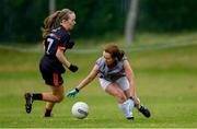 18 May 2019; Dympna O'Brien of AIB in action against Maria Kinsella of PWC in the Cup final at the LGFA Interfirms Blitz 2019 at Naomh Mearnóg GAA Club, Portmarnock, Dublin. This year 12 teams competed for the top prize, while 11 teams signed up to take part in a recreational blitz. Photo by Piaras Ó Mídheach/Sportsfile