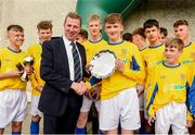 18 May 2019; John Early SFAI Chairman presents Scott Kirkland of Clare with the plate after the U16 SFAI Subway Plate Final match between Clare and Cavan/Monaghan in Gainstown, Mullingar, Co. Westmeath. Photo by Oliver McVeigh/Sportsfile