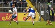 18 May 2019; Kieran Hughes of Monaghan in action against Niall Murray of Cavan with a dog chasing them  during the Ulster GAA Football Senior Championship quarter-final match between Cavan and Monaghan at Kingspan Breffni in Cavan. Photo by Oliver McVeigh/Sportsfile