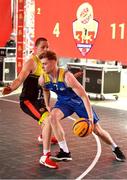 18 May 2019; Graham Brannelly of DCU Saints in action against Roland Vailuls of IT Carlow Basketball during the second annual Hula Hoops 3x3 Basketball Championships at Bray Seafront in Co.Wicklow. Photo by Ray McManus/Sportsfile