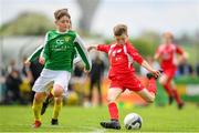 19 May 2019; Cathal O'Sullivan of Cork in action against Oisin McHugh of Donegal during the Under 12 SFAI Subway Championship Final match between Donegal and Cork at Mullingar Athletic in Gainstown, Westmeath. Photo by Ramsey Cardy/Sportsfile