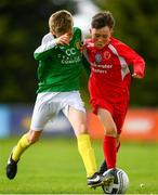 19 May 2019; Danny Miskella of Cork in action against Ruairi Connaghan of Donegal during the Under 12 SFAI Subway Championship Final match between Donegal and Cork at Mullingar Athletic in Gainstown, Westmeath. Photo by Ramsey Cardy/Sportsfile