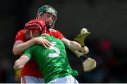 19 May 2019; Jack Cahalane of Cork in action against Michael Keane of Limerick during the Electric Ireland Munster Minor Hurling Championship match between Limerick and Cork at the LIT Gaelic Grounds in Limerick. Photo by Piaras Ó Mídheach/Sportsfile