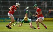 19 May 2019; Cathal O'Neill of Limerick in action against Ethan Twomey, left, and Brian O'Sullivan of Cork during the Electric Ireland Munster Minor Hurling Championship match between Limerick and Cork at the LIT Gaelic Grounds in Limerick. Photo by Diarmuid Greene/Sportsfile
