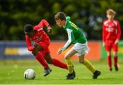19 May 2019; Thomas McDevitt of Donegal in action against Denzell Ogbene of Cork during the Under 12 SFAI Subway Championship Final match between Donegal and Cork at Mullingar Athletic in Gainstown, Westmeath. Photo by Ramsey Cardy/Sportsfile