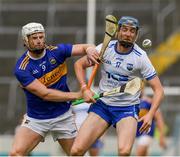 19 May 2019; Michael Breen of Tipperary in action against Kieran Bennett of Waterford  during the Munster GAA Hurling Senior Championship Round 2 match between Tipperary and Waterford at Semple Stadium, Thurles in Tipperary. Photo by Ray McManus/Sportsfile
