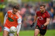 19 May 2019; Jamie Clarke of Armagh in action against Gerard Collins of Down during the GAA Football Senior Championship quarter-final match between Down and Armagh at Pairc Esler in Newry. Photo by Philip Fitzpatrick/Sportsfile