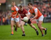 19 May 2019; Ethan Rafferty of Armagh in action against  Conor Maginn of Down during the GAA Football Senior Championship quarter-final match between Down and Armagh at Pairc Esler in Newry. Photo by Philip Fitzpatrick/Sportsfile