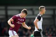 19 May 2019; Johnny Heaney of Galway celebrates after scoring his side's second goal  as Adrian McIntyre of Sligo looks dejected during the Connacht GAA Football Senior Championship semi-final match between Sligo and Galway at Markievicz Park in Sligo. Photo by Harry Murphy/Sportsfile