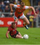 19 May 2019; Paul Hughes of Armagh in action against Darren O'Hagan of Down during the GAA Football Senior Championship quarter-final match between Down and Armagh at Pairc Esler in Newry. Photo by Philip Fitzpatrick/Sportsfile