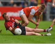 19 May 2019; Paul Hughes of Armagh in action against Darren O'Hagan of Down during the GAA Football Senior Championship quarter-final match between Down and Armagh at Páirc Esler in Newry. Photo by Philip Fitzpatrick/Sportsfile