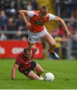 19 May 2019; Paul Hughes of Armagh in action against  Darren O'Hagan of Down during the GAA Football Senior Championship quarter-final match between Down and Armagh at Páirc Esler in Newry. Photo by Philip Fitzpatrick/Sportsfile
