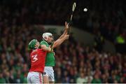 19 May 2019; Aaron Gillane of Limerick in action against Eoin Cadogan of Cork during the Munster GAA Hurling Senior Championship Round 2 match between Limerick and Cork at the LIT Gaelic Grounds in Limerick. Photo by Diarmuid Greene/Sportsfile