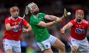 19 May 2019; Cian Lynch of Limerick in action against Stephen McDonnell, left, and Bill Cooper of Cork during the Munster GAA Hurling Senior Championship Round 2 match between Limerick and Cork at the LIT Gaelic Grounds in Limerick. Photo by Piaras Ó Mídheach/Sportsfile