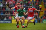 19 May 2019; Darragh O'Donovan of Limerick in action against Bill Cooper of Cork during the Munster GAA Hurling Senior Championship Round 2 match between Limerick and Cork at the LIT Gaelic Grounds in Limerick. Photo by Diarmuid Greene/Sportsfile