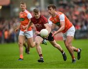 19 May 2019; Ethan Rafferty of Armagh in action against  Conor Maginn of Down during the GAA Football Senior Championship quarter-final match between Down and Armagh at Páirc Esler in Newry. Photo by Philip Fitzpatrick/Sportsfile