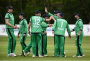 21 May 2019; The Ireland players celebrate after the fall of a wicket during the GS Holdings ODI Challenge between Ireland and Afghanistan at Stormont in Belfast. Photo by Oliver McVeigh/Sportsfile