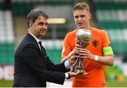 19 May 2019; Netherlands captain Kenneth Taylor is presented with the trophy by Michele Uva, Vice President of UEFA Executive Committee, after the 2019 UEFA U17 European Championship Final match between Netherlands and Italy at Tallaght Stadium in Dublin, Ireland. Photo by Brendan Moran/Sportsfile