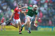 19 May 2019; Cian Lynch of Limerick gets past Mark Coleman of Cork during the Munster GAA Hurling Senior Championship Round 2 match between Limerick and Cork at the LIT Gaelic Grounds in Limerick. Photo by Piaras Ó Mídheach/Sportsfile
