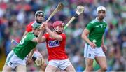 19 May 2019; Daniel Kearney of Cork clears his lines under pressure from William O'Donoghue of Limerick as Mark Ellis of Cork and Kyle Hayes of Limerick look on during the Munster GAA Hurling Senior Championship Round 2 match between Limerick and Cork at the LIT Gaelic Grounds in Limerick. Photo by Piaras Ó Mídheach/Sportsfile