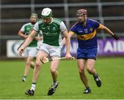 25 May 2019; John Paul McGarry of Fermanagh in action against Daire Maskey of Lancashire during the Lory Meagher Cup Round 2 match between Fermanagh and Lancashire at Brewster Park in Fermanagh. Photo by Oliver McVeigh/Sportsfile