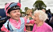 25 May 2019; Jockey Jamie Spencer celebrates with Co-owner Anne Plummer after winning the Tattersalls Irish 2,000 Guineas on Phoenix of Spain at The Curragh Racecourse in Kildare. Photo by Matt Browne/Sportsfile