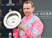 25 May 2019; Jamie Spencer with the Cup after winning the Tattersalls Irish 2,000 Guineas on Phoenix of Spain at The Curragh Racecourse in Kildare. Photo by Matt Browne/Sportsfile