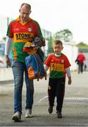 25 May 2019; Jack Clarke, age 6, from Old loughlin, Carlow, makes his way into the ground with his father James ahead of the Leinster GAA Football Senior Championship Quarter-Final match between Carlow and Meath at O’Moore Park in Portlaoise, Laois. Photo by Eóin Noonan/Sportsfile