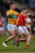 25 May 2019; Mark Forkan of Mayo in action against Riordan O'Rourke of Leitrim during the Connacht GAA Football Junior Championship Semi-Final match between Mayo and Leitrim at Elverys MacHale Park in Castlebar, Mayo. Photo by Stephen McCarthy/Sportsfile