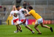 25 May 2019; Matthew Donnelly of Tyrone in action against Patrick Gallagher of Antrim during the Ulster GAA Football Senior Championship Quarter-Final match between Antrim and Tyrone at the Athletic Grounds in Armagh. Photo by Oliver McVeigh/Sportsfile