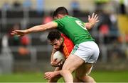 25 May 2019; Diarmuid Walshe of Carlow in action against Donal Keogan of Meath during the Leinster GAA Football Senior Championship Quarter-Final match between Carlow and Meath at O’Moore Park in Portlaoise, Laois. Photo by Ray McManus/Sportsfile