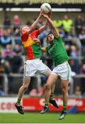 25 May 2019; Conor Doyle of Carlow in action against Donal Keogan of Meath during the Leinster GAA Football Senior Championship Quarter-Final match between Carlow and Meath at O’Moore Park in Portlaoise, Laois. Photo by Eóin Noonan/Sportsfile