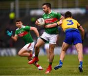 25 May 2019; Kevin McLoughlin of Mayo in action against Sean Mullooly of Roscommon during the Connacht GAA Football Senior Championship Semi-Final match between Mayo and Roscommon at Elverys MacHale Park in Castlebar, Mayo. Photo by Stephen McCarthy/Sportsfile