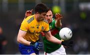 25 May 2019; Conor Daly of Roscommon in action against Darren Coen of Mayo during the Connacht GAA Football Senior Championship Semi-Final match between Mayo and Roscommon at Elverys MacHale Park in Castlebar, Mayo. Photo by Stephen McCarthy/Sportsfile