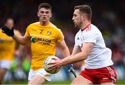 25 May 2019; Niall Sludden of Tyrone in action against Patrick McCormick of Antrim during the Ulster GAA Football Senior Championship Quarter-Final match between Antrim and Tyrone at the Athletic Grounds in Armagh. Photo by Oliver McVeigh/Sportsfile