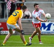 25 May 2019; Tiernan McCann of Tyrone in action against Ryan McNulty of Antrim during the Ulster GAA Football Senior Championship Quarter-Final match between Antrim and Tyrone at the Athletic Grounds in Armagh. Photo by Oliver McVeigh/Sportsfile