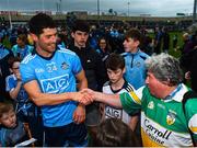 25 May 2019; Rory O'Carroll of Dublin is congratulated by legendary Offaly supporter Mick McDonagh following the Leinster GAA Football Senior Championship Quarter-Final match between Louth and Dublin at O’Moore Park in Portlaoise, Laois. Photo by Eóin Noonan/Sportsfile