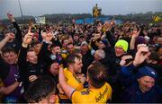 25 May 2019; Roscommon players and supporters celebrate following the Connacht GAA Football Senior Championship Semi-Final match between Mayo and Roscommon at Elverys MacHale Park in Castlebar, Mayo. Photo by Stephen McCarthy/Sportsfile