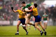 25 May 2019; Patrick Durcan of Mayo in action against Niall Kilroy, left, and David Murray of Roscommon during the Connacht GAA Football Senior Championship Semi-Final match between Mayo and Roscommon at Elverys MacHale Park in Castlebar, Mayo. Photo by Stephen McCarthy/Sportsfile