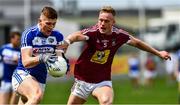 26 May 2019; Evan O'Carroll of Laois in action against Killian Daly of Westmeath  during the GAA Football Senior Championship Quarter-Final match between Westmeath and Laois at Bord na Mona O’Connor Park in Tullamore, Offaly. Photo by Ray McManus/Sportsfile
