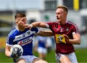 26 May 2019; Evan O'Carroll of Laois in action against Killian Daly of Westmeath  during the GAA Football Senior Championship Quarter-Final match between Westmeath and Laois at Bord na Mona O’Connor Park in Tullamore, Offaly. Photo by Ray McManus/Sportsfile