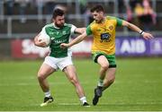 26 May 2019; Kane Connor of Fermanagh in action against Ryan McHugh of Donegal during the Ulster GAA Football Senior Championship Quarter-Final match between Fermanagh and Donegal at Brewster Park in Enniskillen, Fermanagh. Photo by Oliver McVeigh/Sportsfile