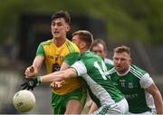 26 May 2019; Michael Langan of Donegal in action against Conall Jones of Fermanagh during the Ulster GAA Football Senior Championship Quarter-Final match between Fermanagh and Donegal at Brewster Park in Enniskillen, Fermanagh. Photo by Philip Fitzpatrick/Sportsfile