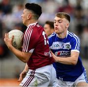 26 May 2019; Ronan O Toole of Westmeath in action against Seán O'Flynn of Laois during the GAA Football Senior Championship Quarter-Final match between Westmeath and Laois at Bord na Mona O’Connor Park in Tullamore, Offaly. Photo by Ray McManus/Sportsfile