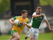 26 May 2019; Eoghan Ban Gallagher of Donegal in action against Aidan Breen of Fermanagh during the Ulster GAA Football Senior Championship Quarter-Final match between Fermanagh and Donegal at Brewster Park in Enniskillen, Fermanagh. Photo by Philip Fitzpatrick/Sportsfile