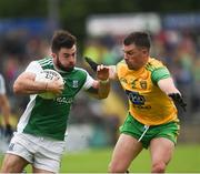 26 May 2019; Kane Connor of Fermanagh in action against Paddy McGrath of Donegal during the Ulster GAA Football Senior Championship Quarter-Final match between Fermanagh and Donegal at Brewster Park in Enniskillen, Fermanagh. Photo by Philip Fitzpatrick/Sportsfile