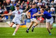26 May 2019; David Slattery of Kildare fires in a shot under pressure from Barry O'Farrell of Longford during the GAA Football Senior Championship Quarter-Final match between Longford and Kildare at Bord na Mona O’Connor Park in Tullamore, Offaly. Photo by Ray McManus/Sportsfile