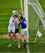 26 May 2019; David McGivney of Longford punches the ball into the square past Kildare full back David Hyland and goalkeeper Mark Donnellan in a move that led to a goal during extra time in the the GAA Football Senior Championship Quarter-Final match between Longford and Kildare at Bord na Mona O’Connor Park in Tullamore, Offaly. Photo by Ray McManus/Sportsfile