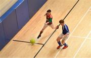 26 May 2019; Mark Hanratty of Inniskeen, Co Monaghan, left, in action against Joshua Marsh of Clonguish, Co Longford, in the Indoor Soccer U13 Boys Semi-Final during Day 2 of the Aldi Community Games May Festival, which saw over 3,500 children take part in a fun-filled weekend at University of Limerick. Photo by Piaras Ó Mídheach/Sportsfile